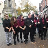 Mayor of Sleaford Coun Robert Oates officially opens The Ivy in Sleaford watched by staff and bosses. EMN-211025-162710001