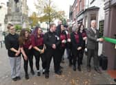 Mayor of Sleaford Coun Robert Oates officially opens The Ivy in Sleaford watched by staff and bosses. EMN-211025-162710001