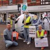 Sleaford Climate Action Network members stage their climate emergency performance near Handley Monument. EMN-210611-180252001