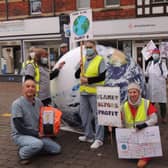 Sleaford Climate Action Network members stage their climate emergency performance near Handley Monument. EMN-210611-180252001