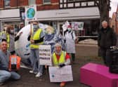 Sleaford Climate Action Network members stage their climate emergency performance near Handley Monument. EMN-210611-180252001