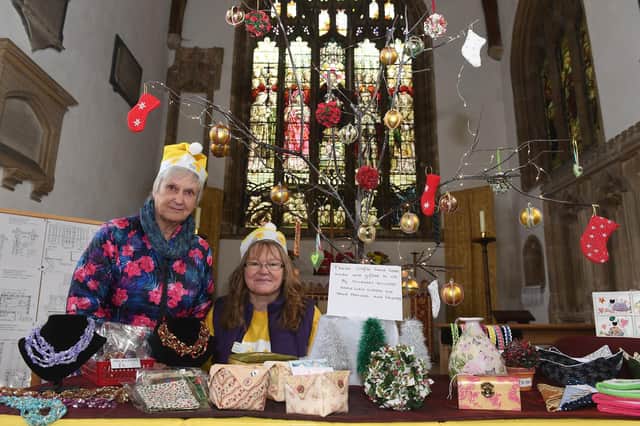 One of the stalls at the last Crafts by Candlelight to take place at St Denis' Church, Silk Willoughby, in 2019. L-R Sue Logan - Marie Curie fundraiser, Helen Wilcox - Marie Curie nurse. EMN-191111-121030001