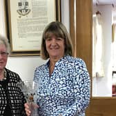 Stoke Rochford's Pam Watson receives her trophy from mum Ruth Greenfield.