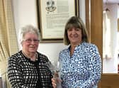 Stoke Rochford's Pam Watson receives her trophy from mum Ruth Greenfield.