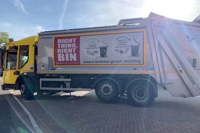'Right thing, right bin' reminders on the side of collection lorries. EMN-210311-170656001