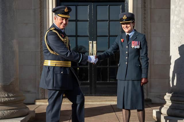 New Commandant of RAF College Cranwell, Air Commodore Andrew Dickens is met by Station Commander Group Captain Dr JoanneCampbell in front of College Hall Officers Mess. Photo: RAF EMN-210511-154807001