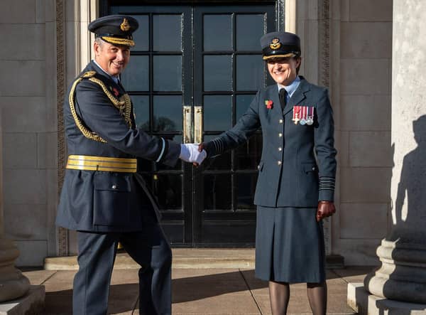 New Commandant of RAF College Cranwell, Air Commodore Andrew Dickens is met by Station Commander Group Captain Dr Joanne
Campbell in front of College Hall Officers Mess. Photo: RAF EMN-210511-154807001