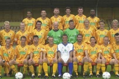 Jones (top row, third from left) and Potter (middle row, third from right) in the 2003-04 season.