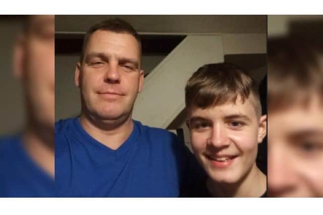 The victim Roberts Buncis pictured with his father. (Family photo).