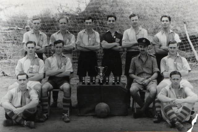 Joseph Kiel's grandad is on the back row, second from right, in the photo marked as "The 353 squadron team with trophies". EMN-210811-162102001