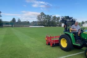 Market Rasen Town Football Club volunteer groundsman Kevin Bett using some of the new equipment to enable the players to enjoy better playing surfaces at Rase Park for the next few years. EMN-210911-090258001