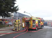 The factory building was extensively damaged and has since been demolished. EMN-210911-170449001