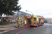 The factory building was extensively damaged and has since been demolished. EMN-210911-170449001