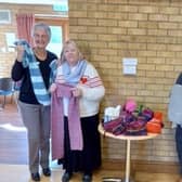 Leasingham WI pose with their scarves.