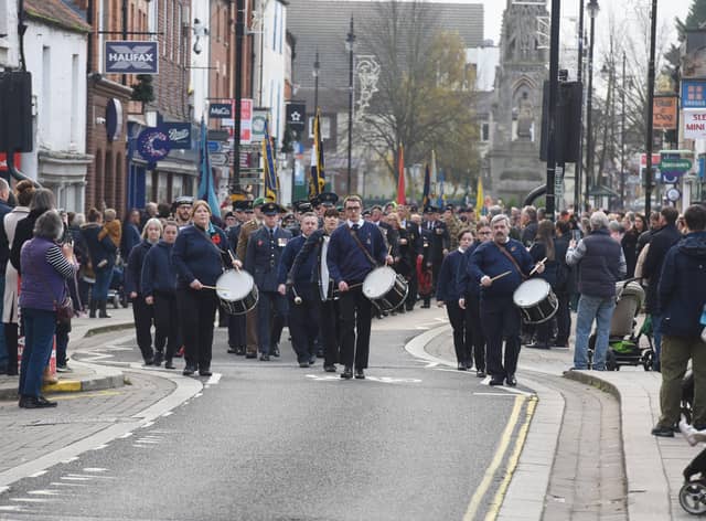 The Remembrance Sunday parade heads up Southgate in Sleaford. EMN-211115-103503001