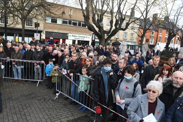Crowds at Sleaford Market Place on Remembrance Sunday. EMN-211115-103619001