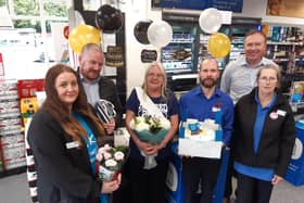 Sandra Taylor (centre)s last day at Co-op, from left: Sheryle Hay, Co-op regional manager Phil Waddington, store manager Adam Waddingham and general manager Craig Adamson. EMN-211011-121920001