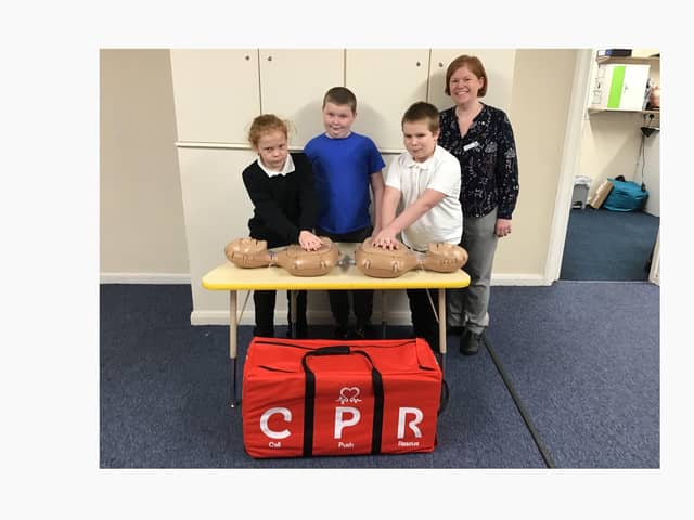 Pupils with assistant headteacher Holly Barrett at Bridge House Indepenent School, in Boston.