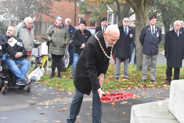 Mayor of Skegness Coun Trevor Burnham laying a wreath.