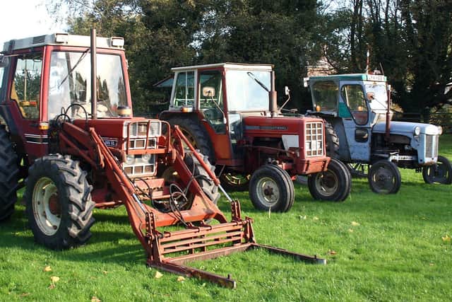 Three of the tractors that are going under the hammer. EMN-211211-130031001