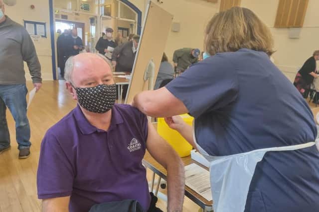 Malcolm Hull of Mablethorpe receiving his booster vaccination.