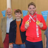 Paralympic double gold medallist Ben Watson is welcomed as charity champion by, from left -  GAIN chairman Chris Fuller, patient liaison Simon Johnson and chief executive Caroline Morrice. EMN-211211-180826001