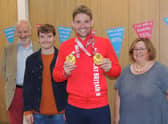 Paralympic double gold medallist Ben Watson is welcomed as charity champion by, from left -  GAIN chairman Chris Fuller, patient liaison Simon Johnson and chief executive Caroline Morrice. EMN-211211-180826001