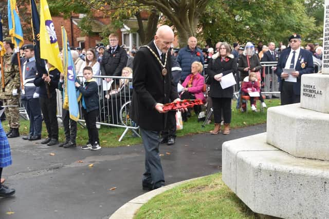 Mayor of Skegness Coun  Trevor Burnham laying a wreath on behalf of Skegness Town Council. Photo: Barry Robinson.