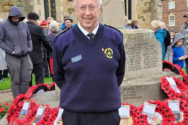 Carl Short lay a wreath at Alford memorial on behalf of the National Coastwatch Institute.