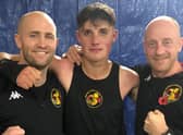 Boston ABC coaches Dennis Watson and Matthew Mooney pictured with Jamie Burgin after his victory on Saturday night.