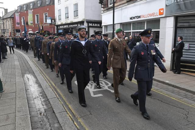 Forces personnel from local stations in the parade through Sleaford. EMN-211115-103832001