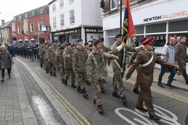 Army cadets march up Southgate. EMN-211115-103820001