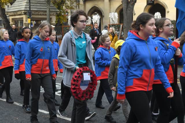 Girl Guides also took part in the parade. EMN-211115-103736001