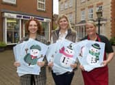 From left - Harriet Baker of Millstream Square, Lucy Newton and Sarah Graves of Bristol Arcade with their snowmen trail