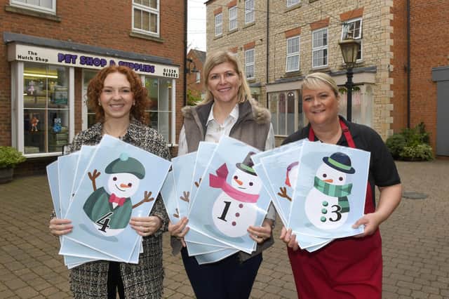 From left - Harriet Baker of Millstream Square, Lucy Newton and Sarah Graves of Bristol Arcade with their snowmen trail