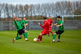 Mitch Griffiths slides in against Heanor. Photo: Craig Harrison