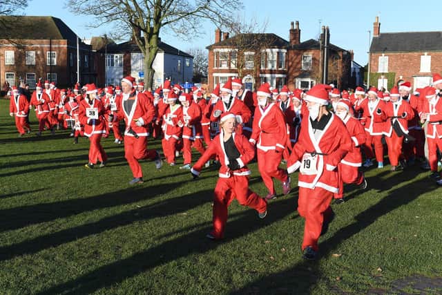 A snapshot of Boston's Santa Run in 2018. Photo by David Dawson.
