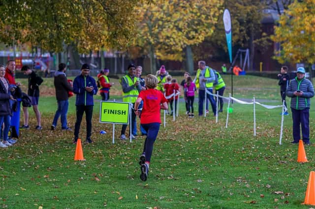 A young runner closes in on the finish line in the first ever Boston parkrun, held in Central Park. Photo: David Dales