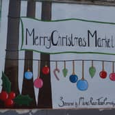 One of the seasonal murals created by Amber Scales EMN-211122-095911001