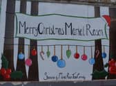 One of the seasonal murals created by Amber Scales EMN-211122-095911001