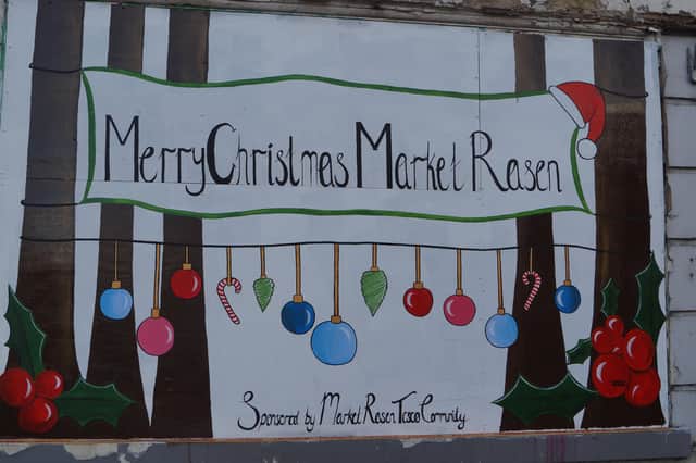 One of the seasonal murals created by Amber Scales EMN-211122-095911001
