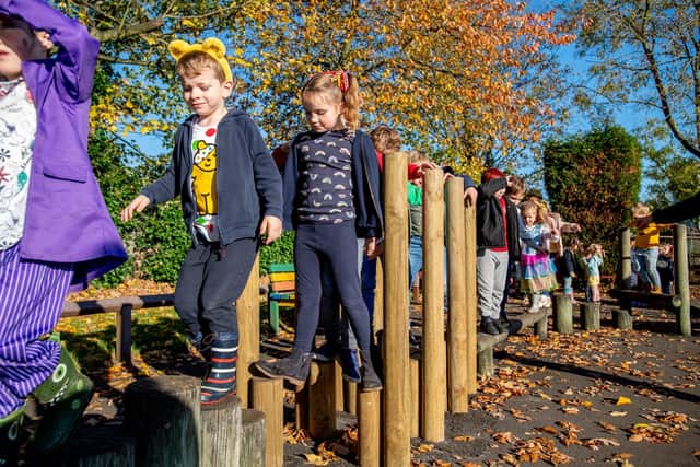 Wragby School children under took a walk around the grounds in their Children in Need attire. EMN-211122-090422001