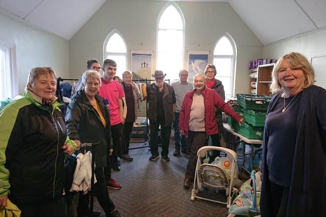 Jill Makinson-Sanders (right) with volunteers and supporters at the baby bank.
