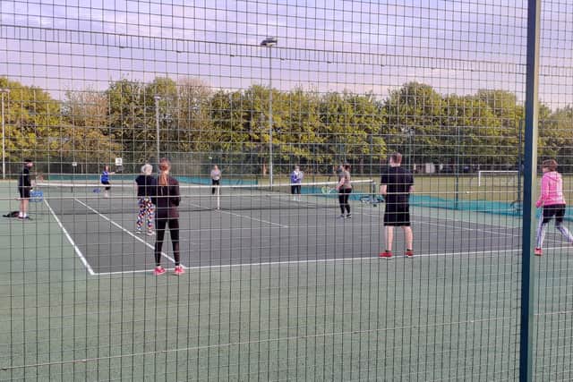A coaching session at Sleaford Tennis Club - set to benefit from the NK LOttery draw. EMN-211123-153908001
