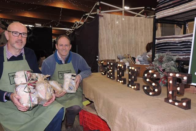 Say cheese! Tim Jones and Dave Wood of Lincolnshire Poacher Cheese, from Ulceby, near Alford. EMN-211127-170535001