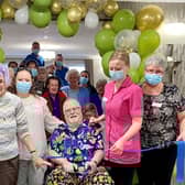 Shelia Pacey (second left) and Bob Sward (centre) and Bob’s wife Rose (far right) and others at the official opening/first anniversary party at Avocet House.