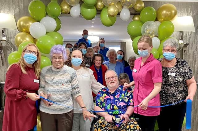 Shelia Pacey (second left) and Bob Sward (centre) and Bob’s wife Rose (far right) and others at the official opening/first anniversary party at Avocet House.