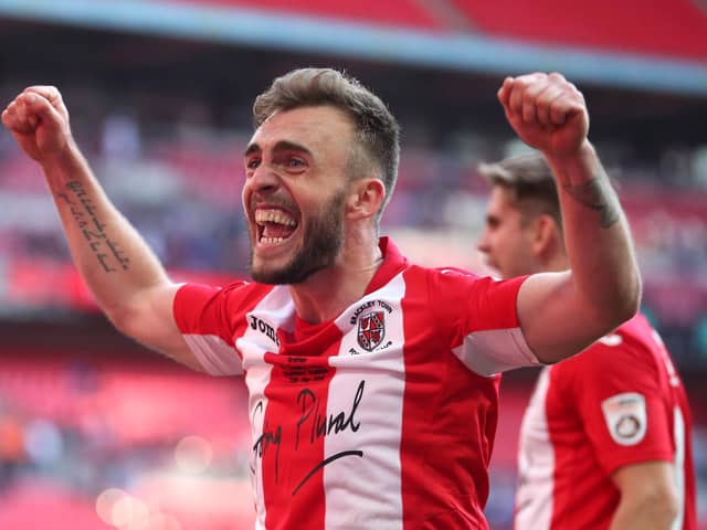 Boston United's Shane Byrne celebrates winning FA Trophy with Brackley - who he faces in the competition on Saturday. Photo: Getty Images