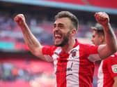 Boston United's Shane Byrne celebrates winning FA Trophy with Brackley - who he faces in the competition on Saturday. Photo: Getty Images