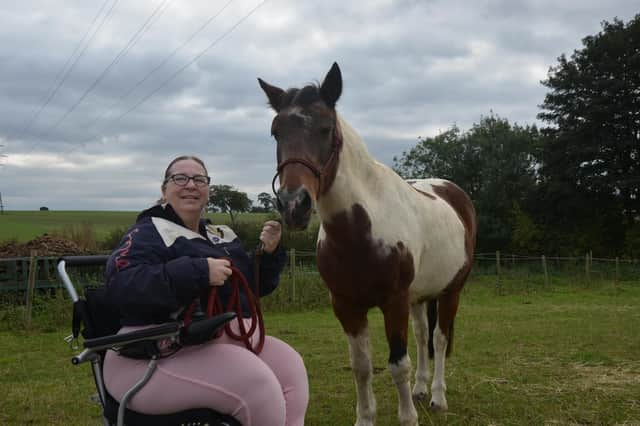 Antonia and her therapist horse, Echo.